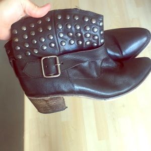 Black leather motorcycle boots.